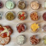 현대인의 ‘장내 생태계’ 변화: 서구화된 식사, 가공식품, 그리고 장 건강 sliced meat with green vegetable and cheese on stainless steel round tray