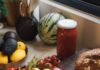 “여성 건강, 작은 습관에서 시작된다”…일상 속 변화로 지키는 건강 관리법 Fresh produce including tomatoes, carrots, and avocados on a counter.